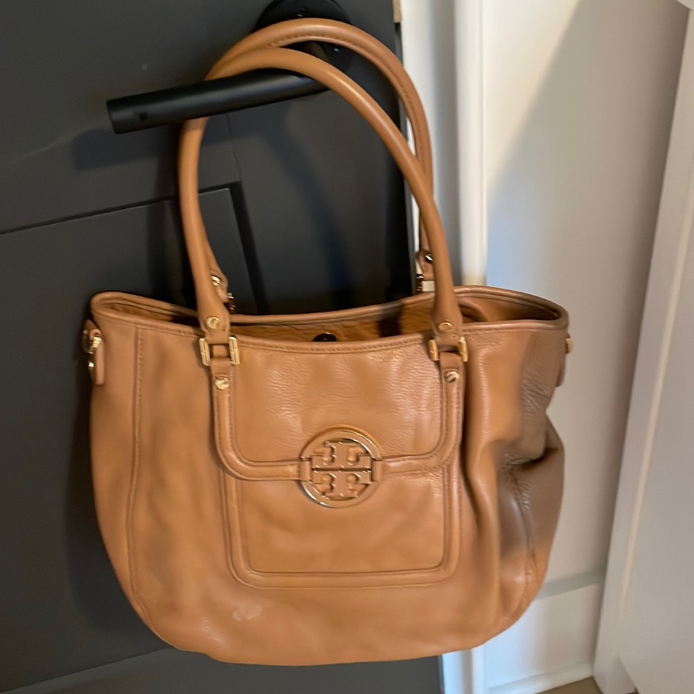 Tory Burch purse with no wear on the outside and minimal wear internally.